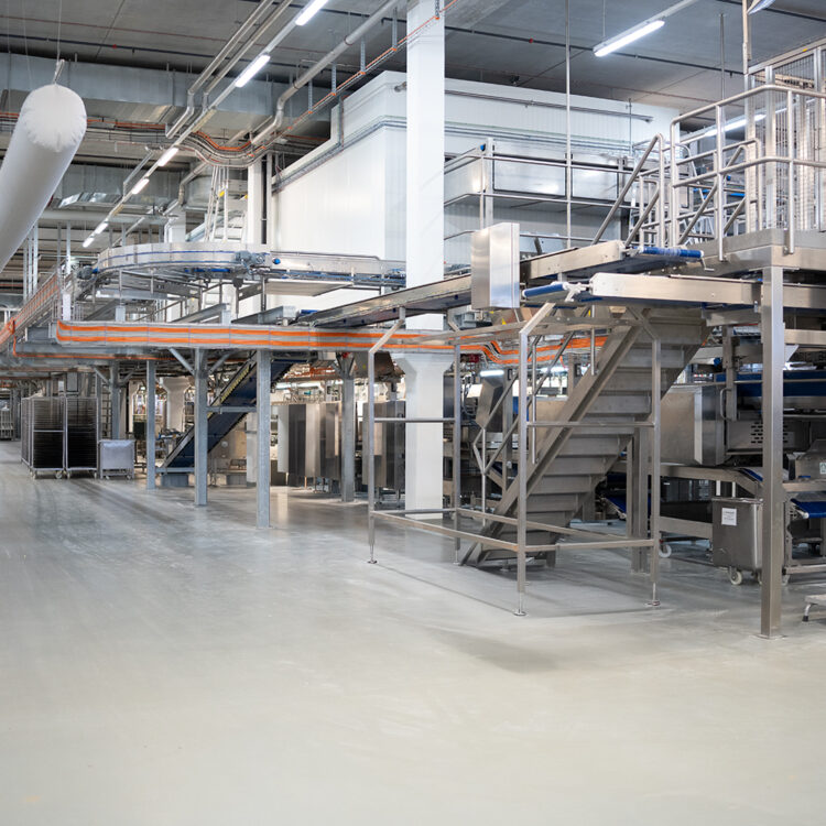 a large industrial building with machinery